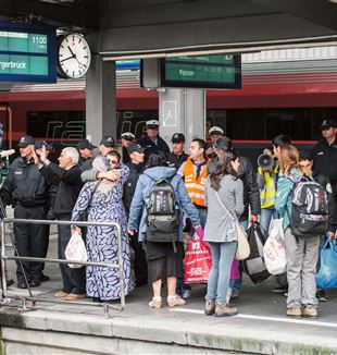 München, 6. September 2015: Flüchtlinge aus Syrien und Irak am Münchner Hauptbahnhof. ©Joerg Koch/Anadolu Agency/Getty Images)