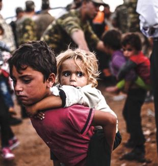 Syrische kurdische Bevölkerung, die gezwungen ist, ihre Heimat zu verlassen.